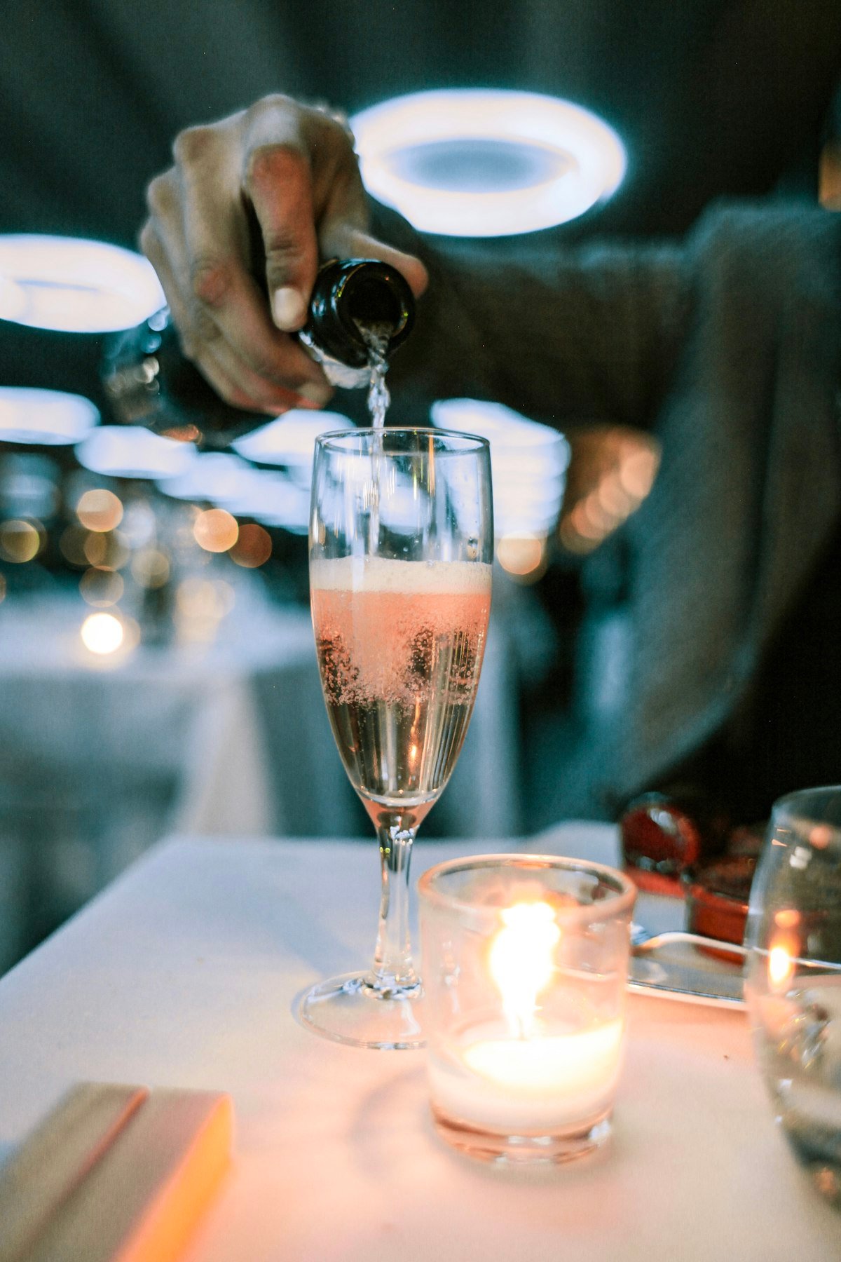 Sommelier pouring a glass